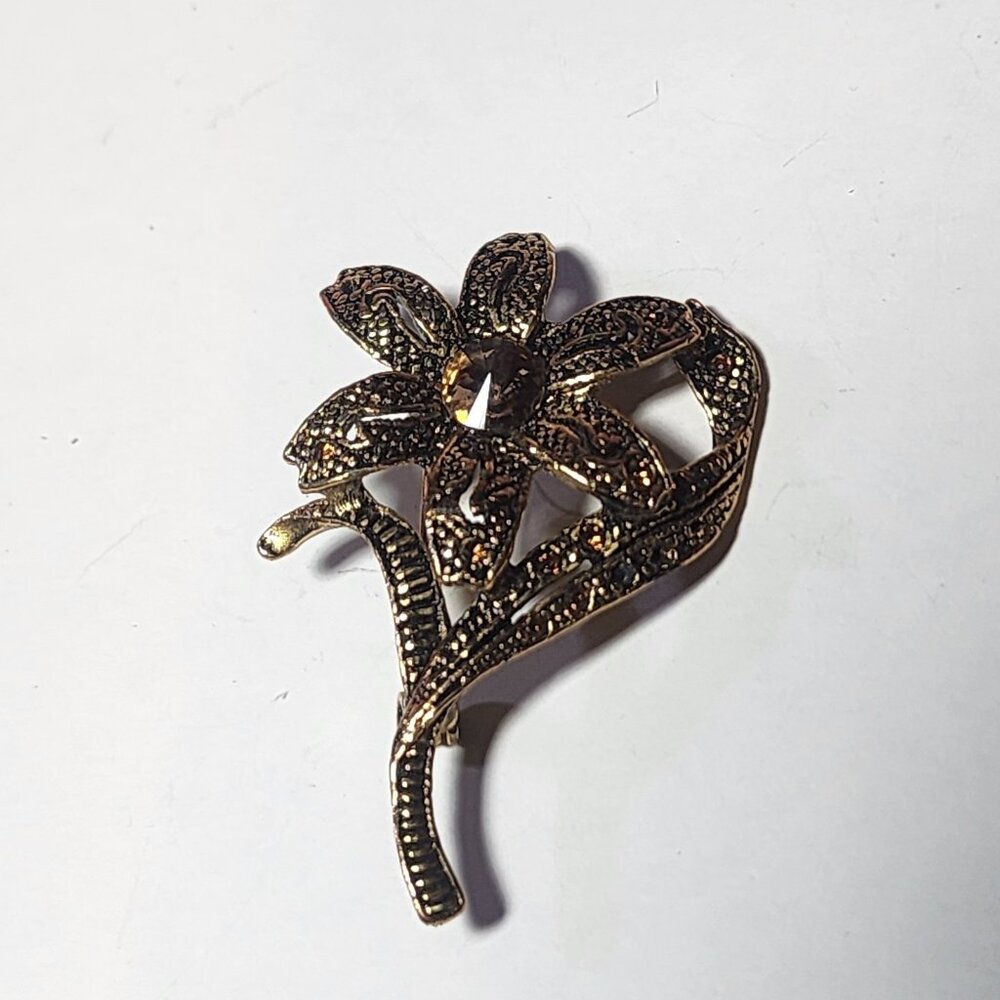 Vintage Gold Tone Flower Brooch Pin with Rhinestones and Intricate Metalwork